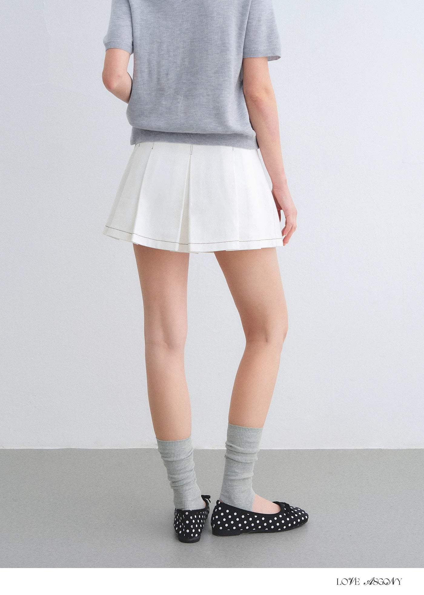 High-Waisted Washed Denim Pleated Mini Skirt
