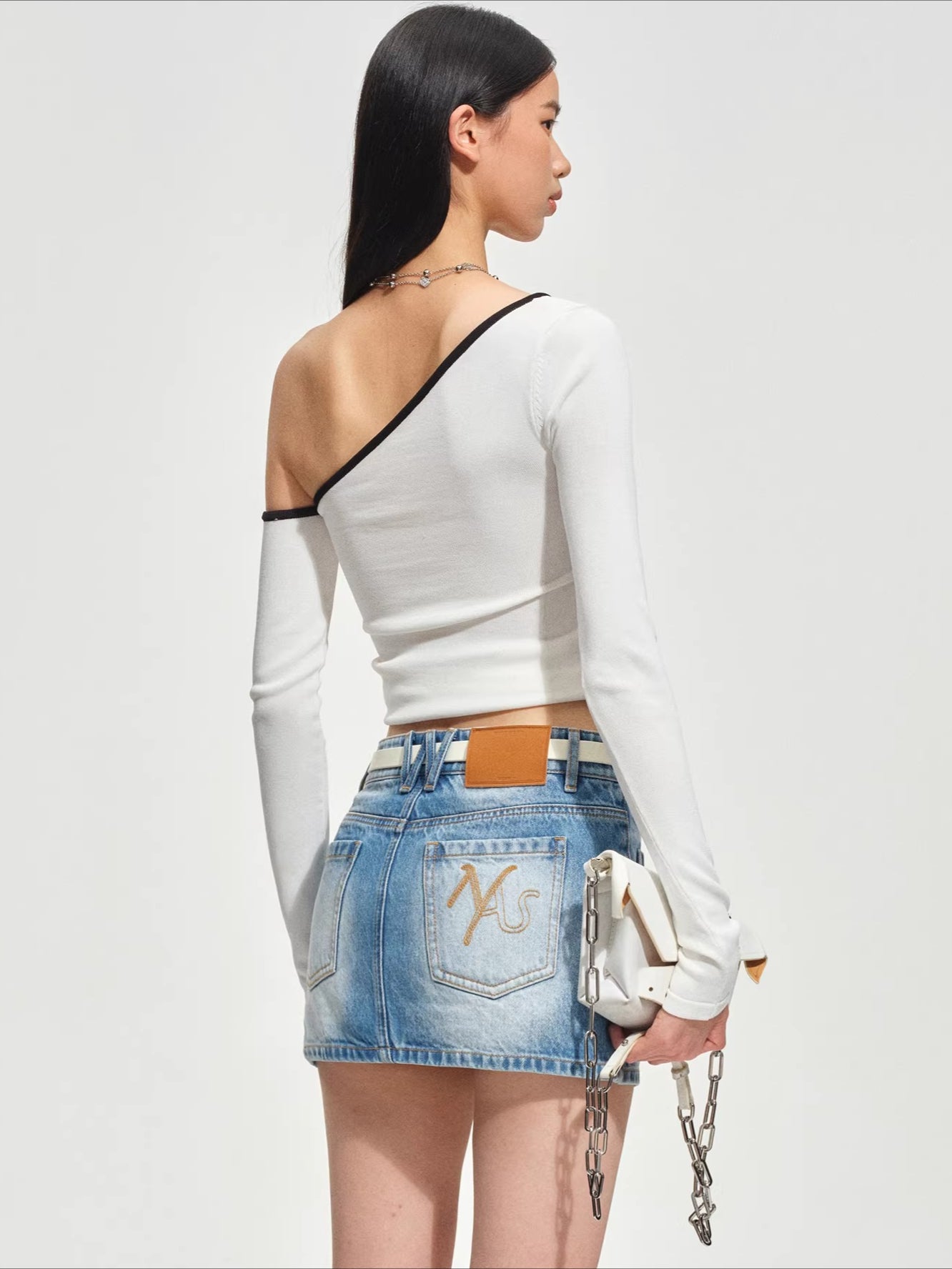 Sculpted Twist Asymmetric Off-Shoulder Knit Crewneck