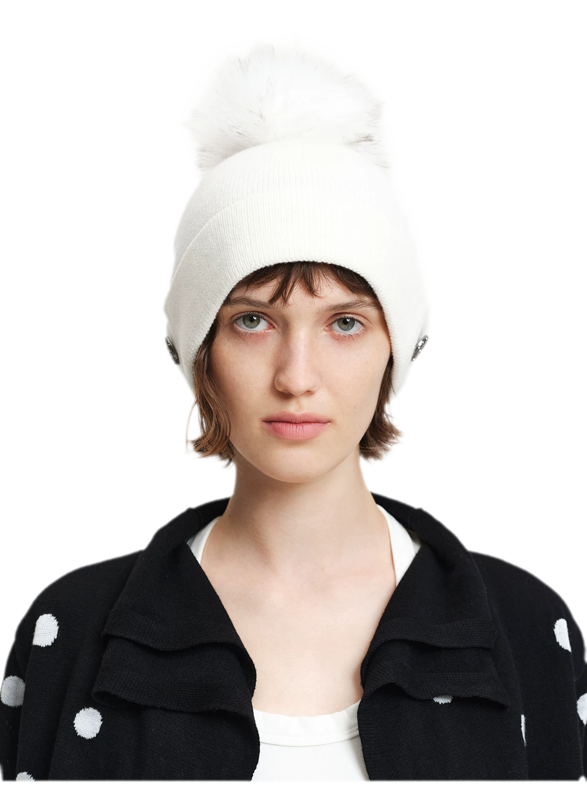 Cappello in lana con pompon e visiera