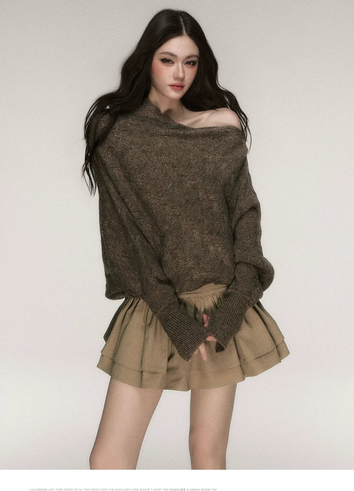 سترة محبوكة سميكة بأكتاف مكشوفة