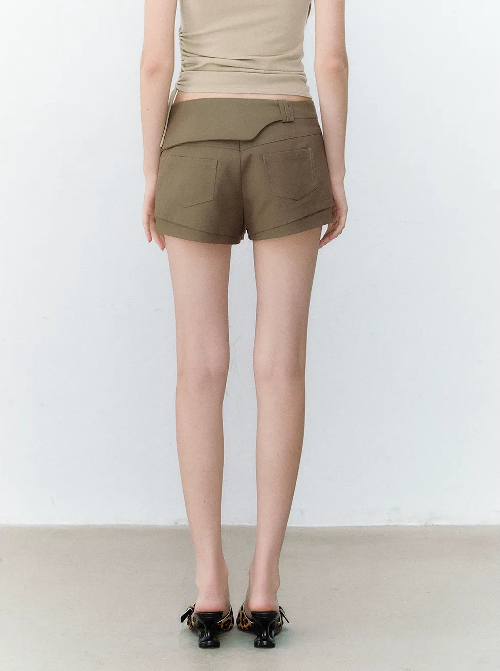 Deconstructed Bow-Tie Hem Studded Shorts