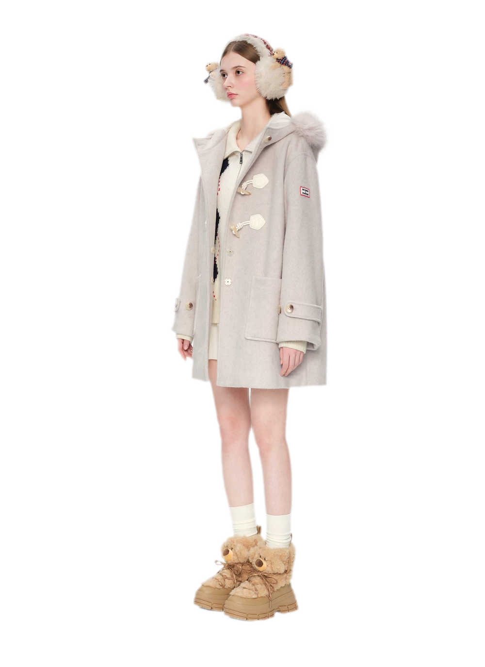 Manteau en laine texturée à boutons brandebourg