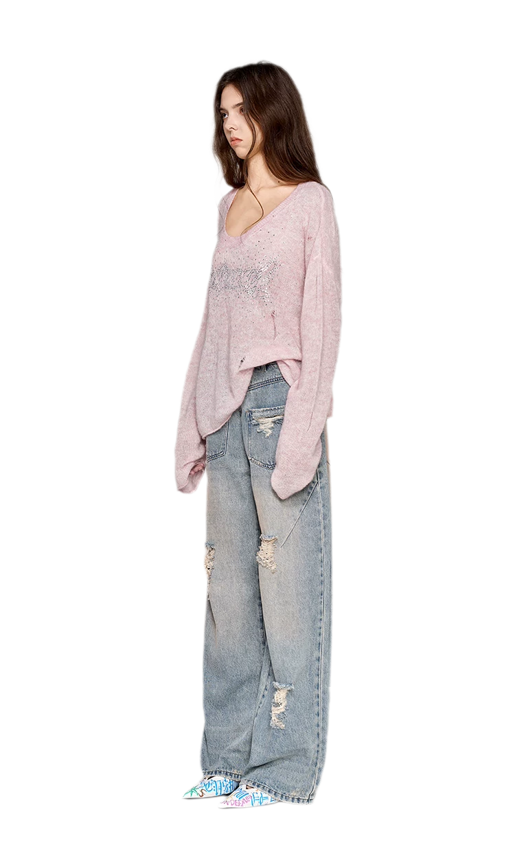 Pullover in mohair effetto consumato con strass