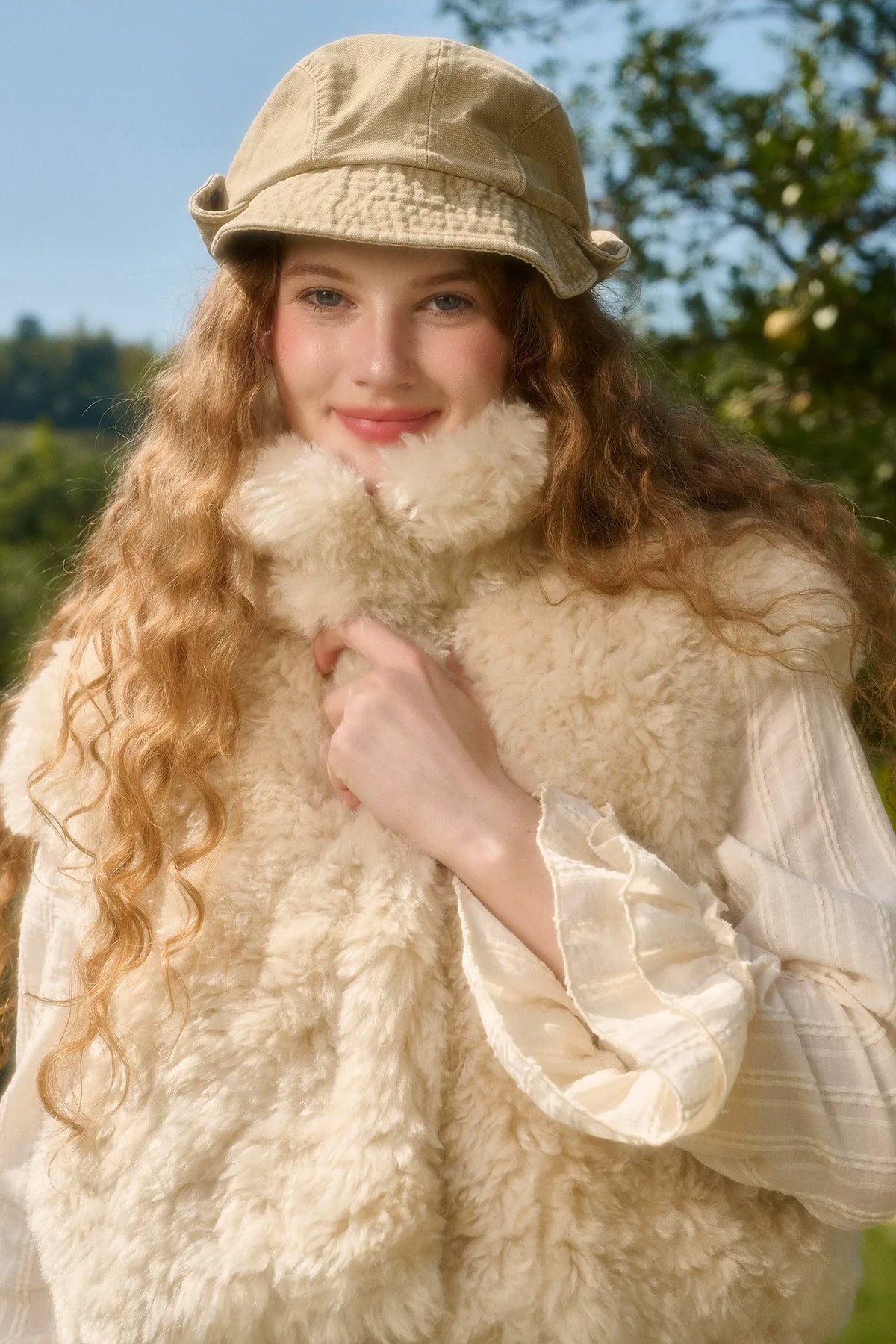 Gilet corto in ecopelliccia