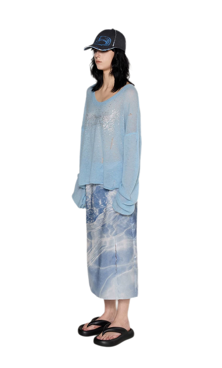 Pullover in mohair effetto consumato con strass