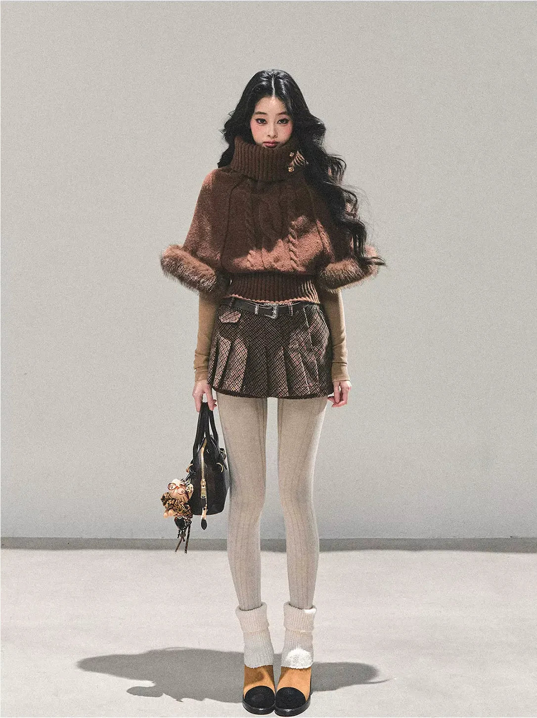 モヘアケーブル編みタートルネックセーター