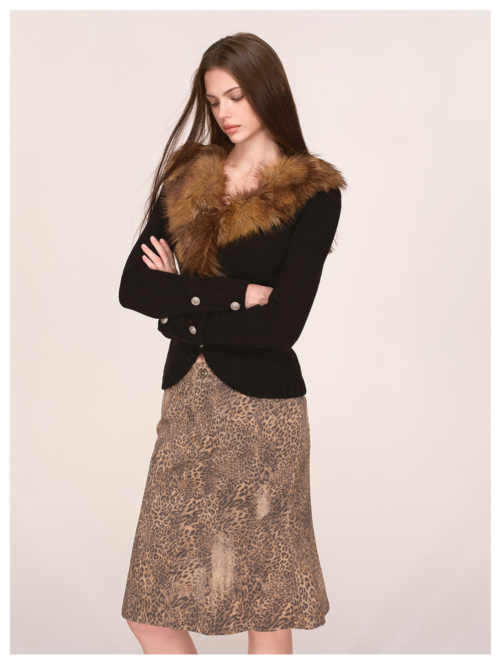 Veste en maille à col en fausse fourrure teintée