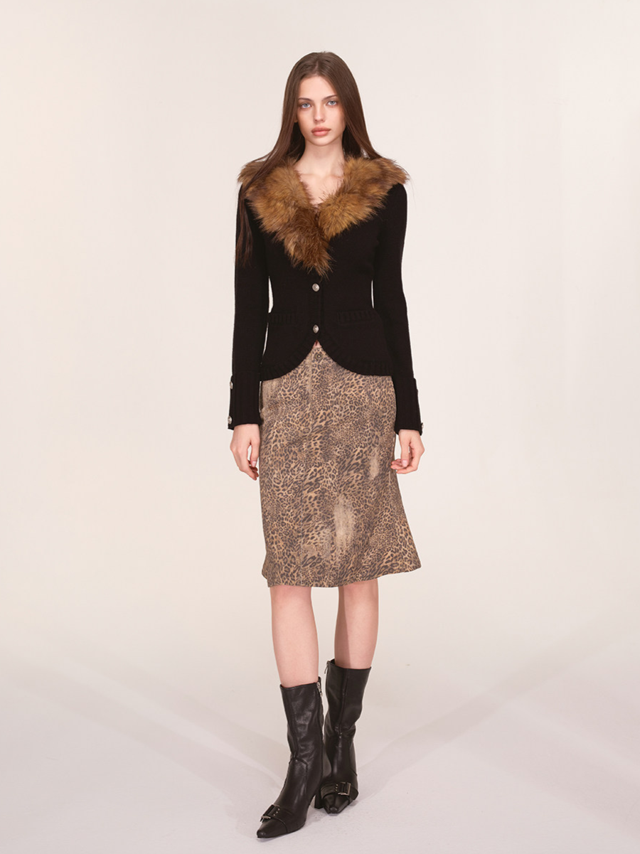 Veste en maille à col en fausse fourrure teintée