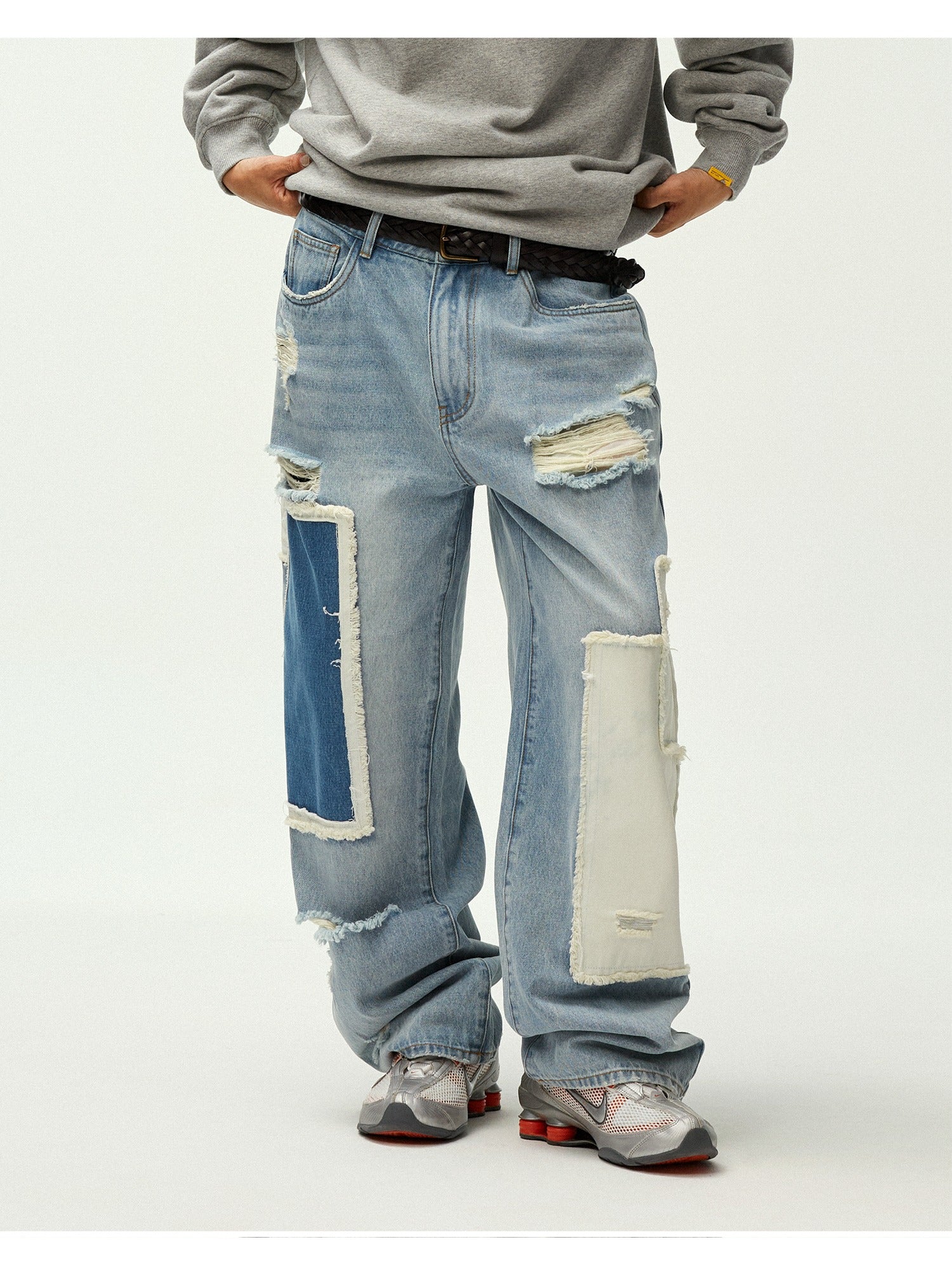Asymmetric Patchwork Distressed Straight-Leg Jeans