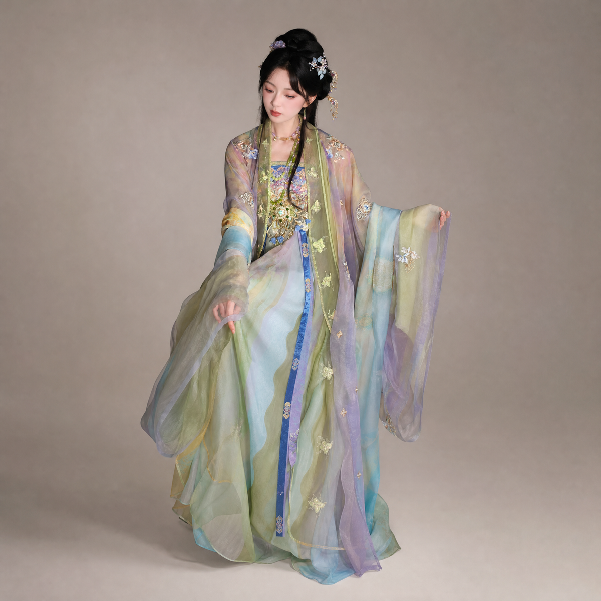 Baoxiang Hanfu with flowing pastel sleeves and embroidered layers.
