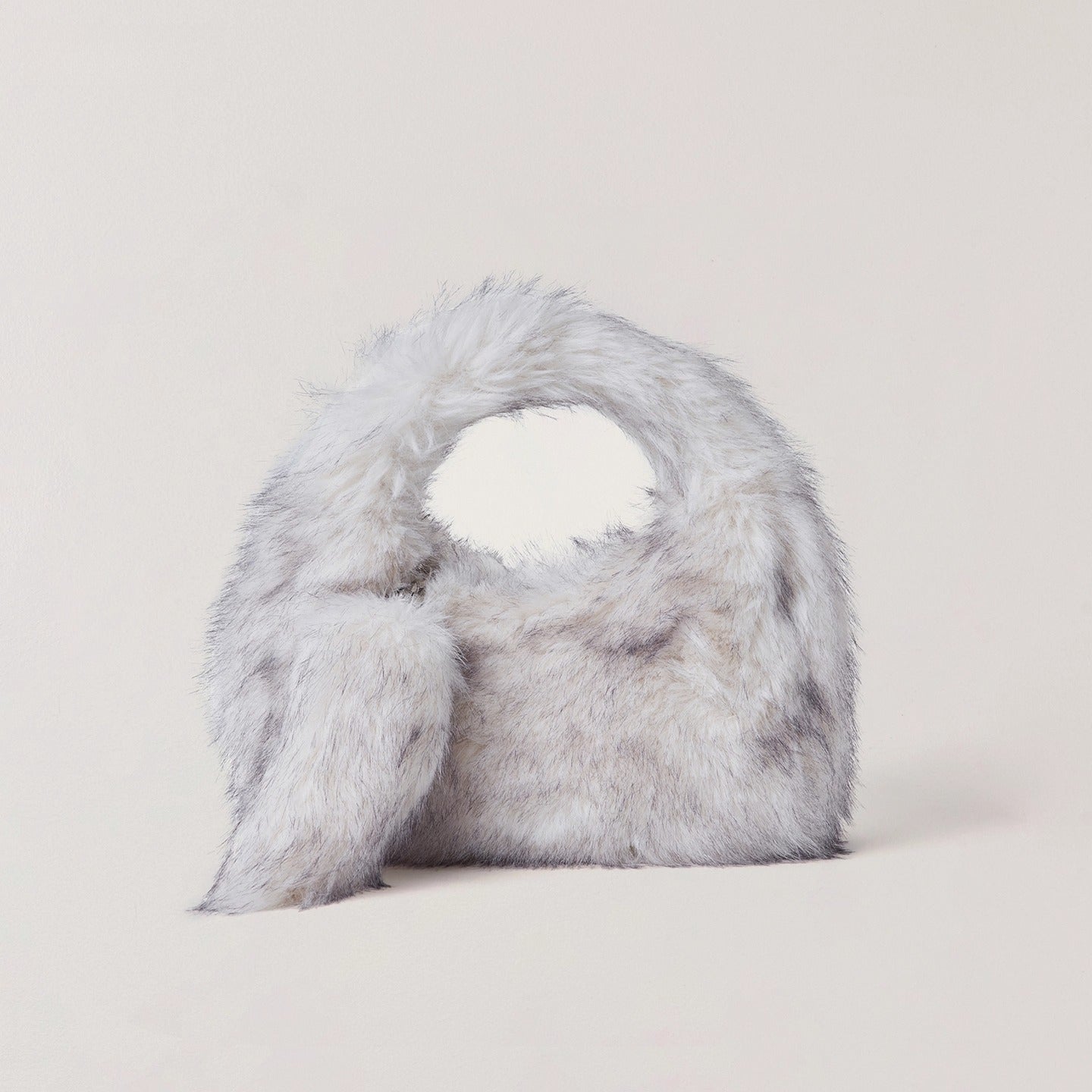 Cross Relic Faux Fur Stone Bag