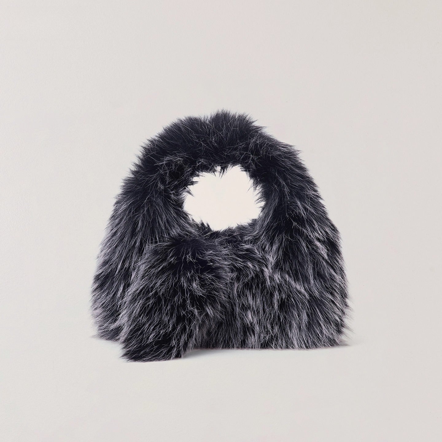 Cross Relic Faux Fur Stone Bag