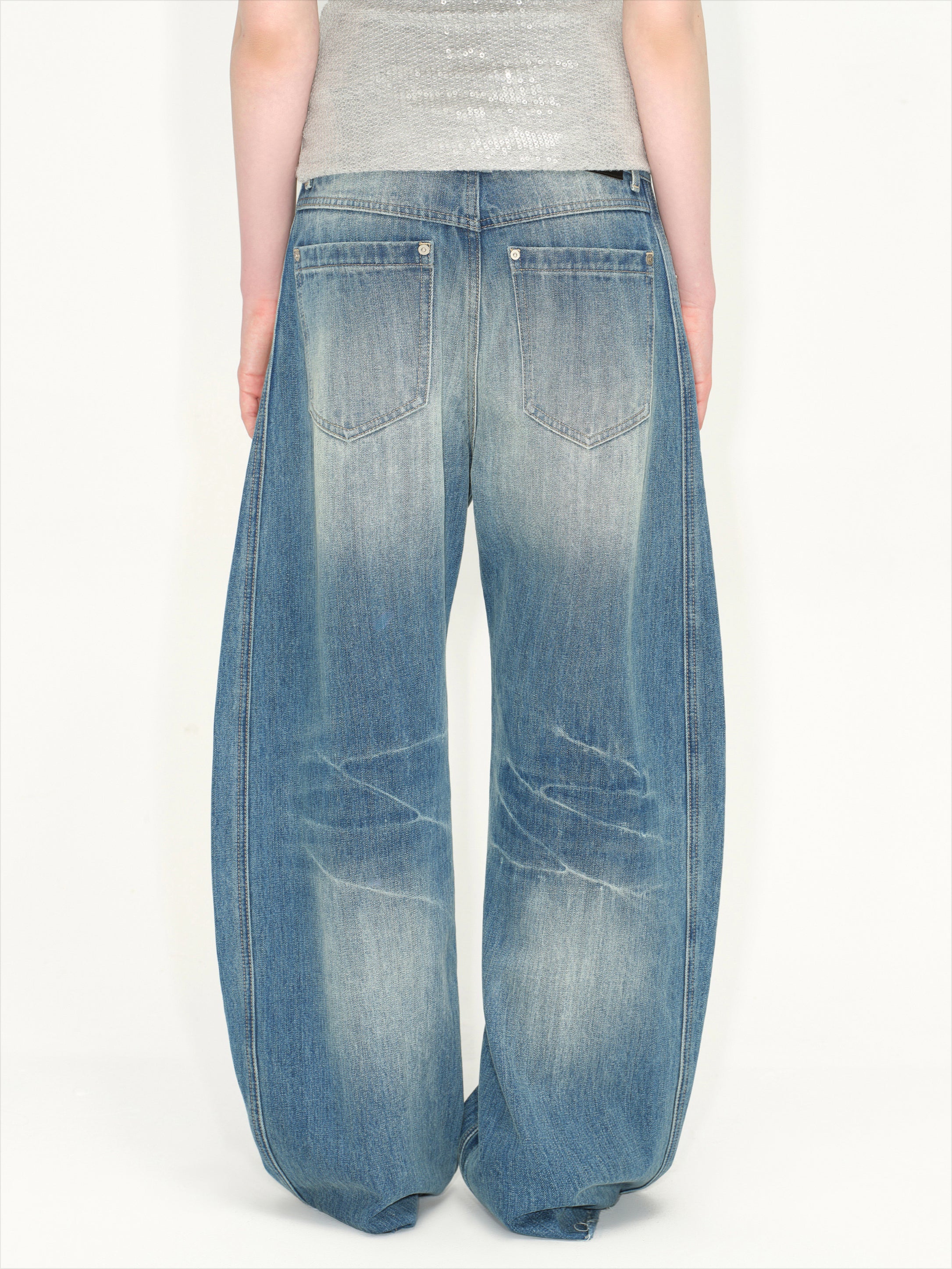 Wash Deconstructed Curved Denim Pants