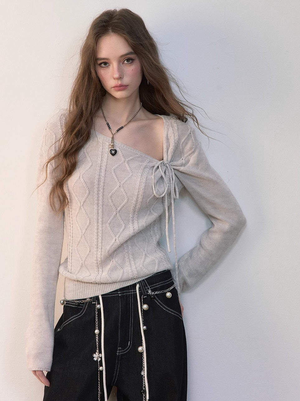Asymmetrical Tie-Neck Cable Knit Sweater