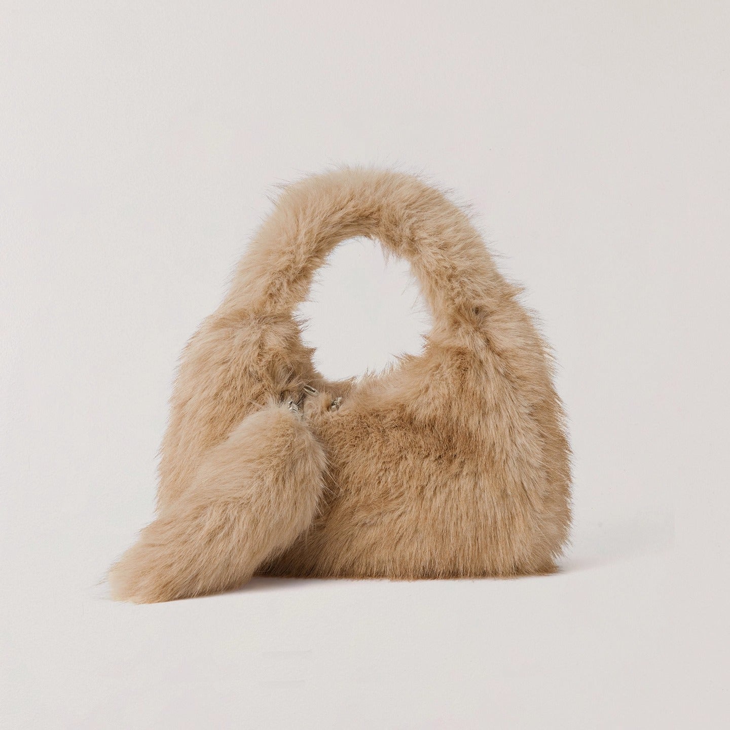 Cross Relic Faux Fur Stone Bag