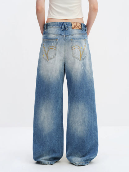 Washed Blue Curved-Leg Wide Denim Jeans
