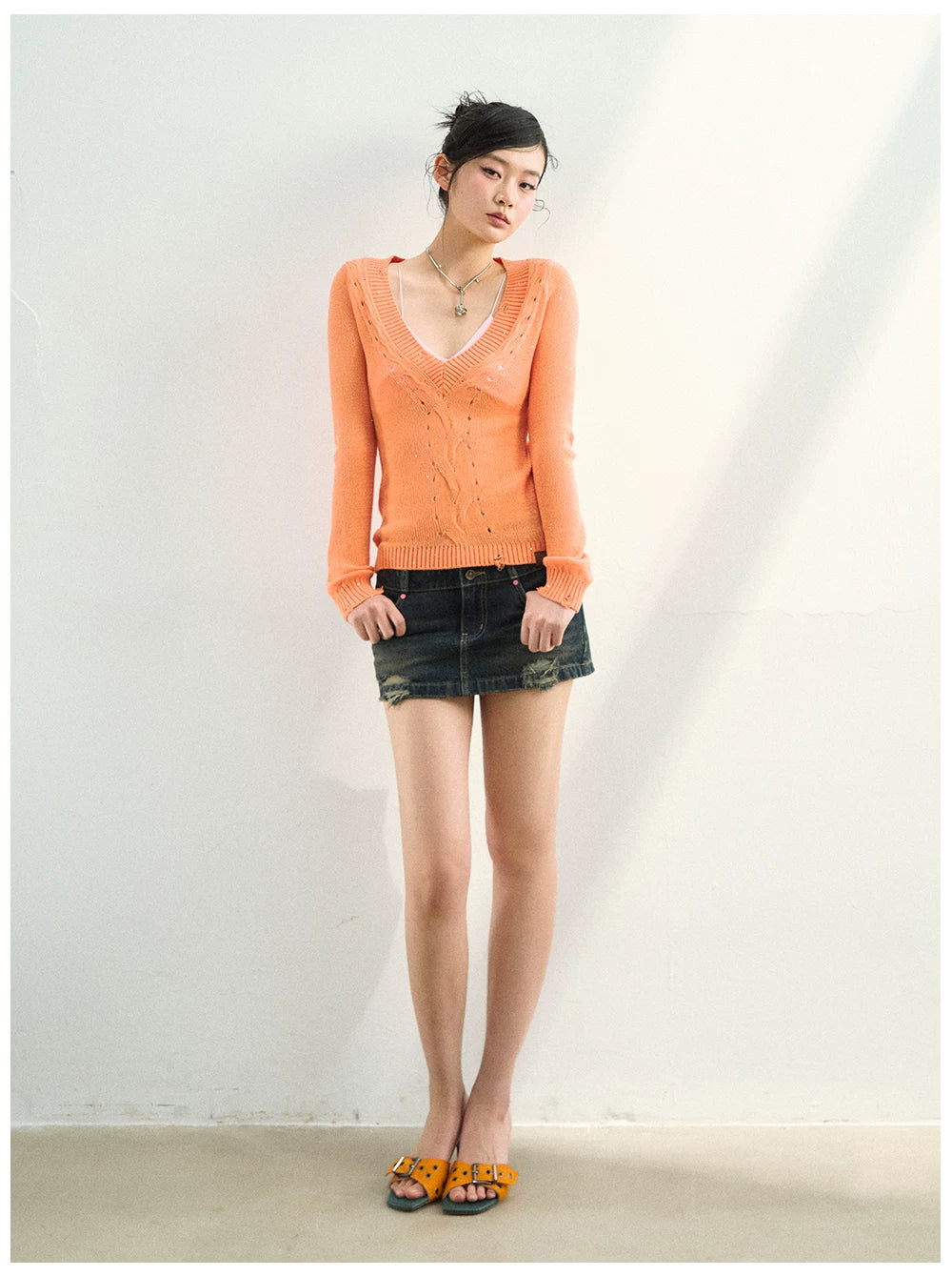Distressed Openwork V-Neck Knit Top