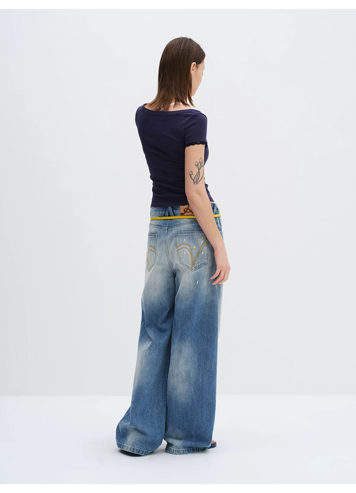Washed Blue Curved-Leg Wide Denim Jeans