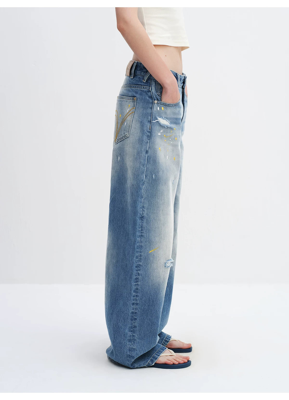 Washed Blue Curved-Leg Wide Denim Jeans