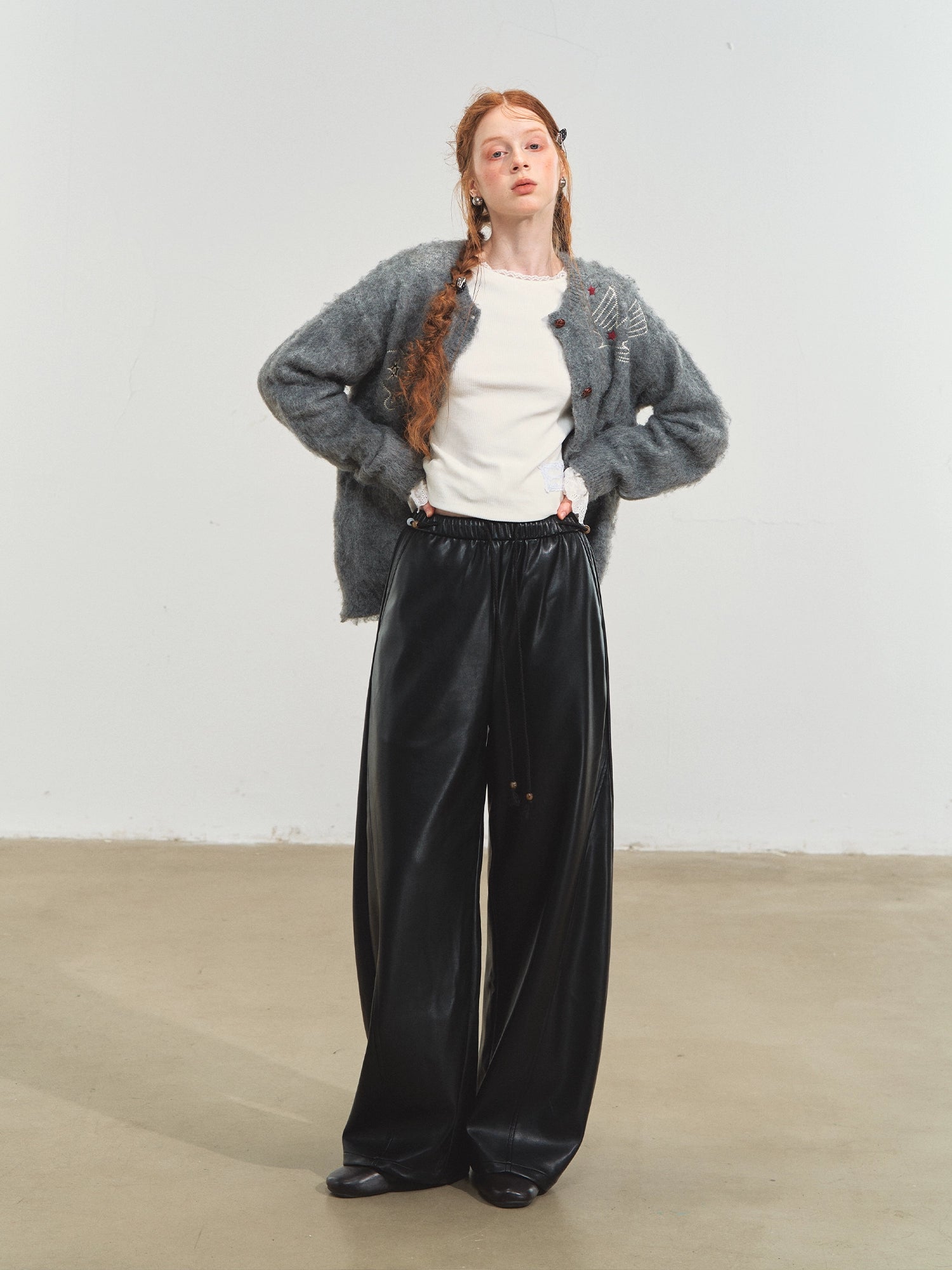 Relaxed Curve‑Hem PU Pants - CHINASQUAD
