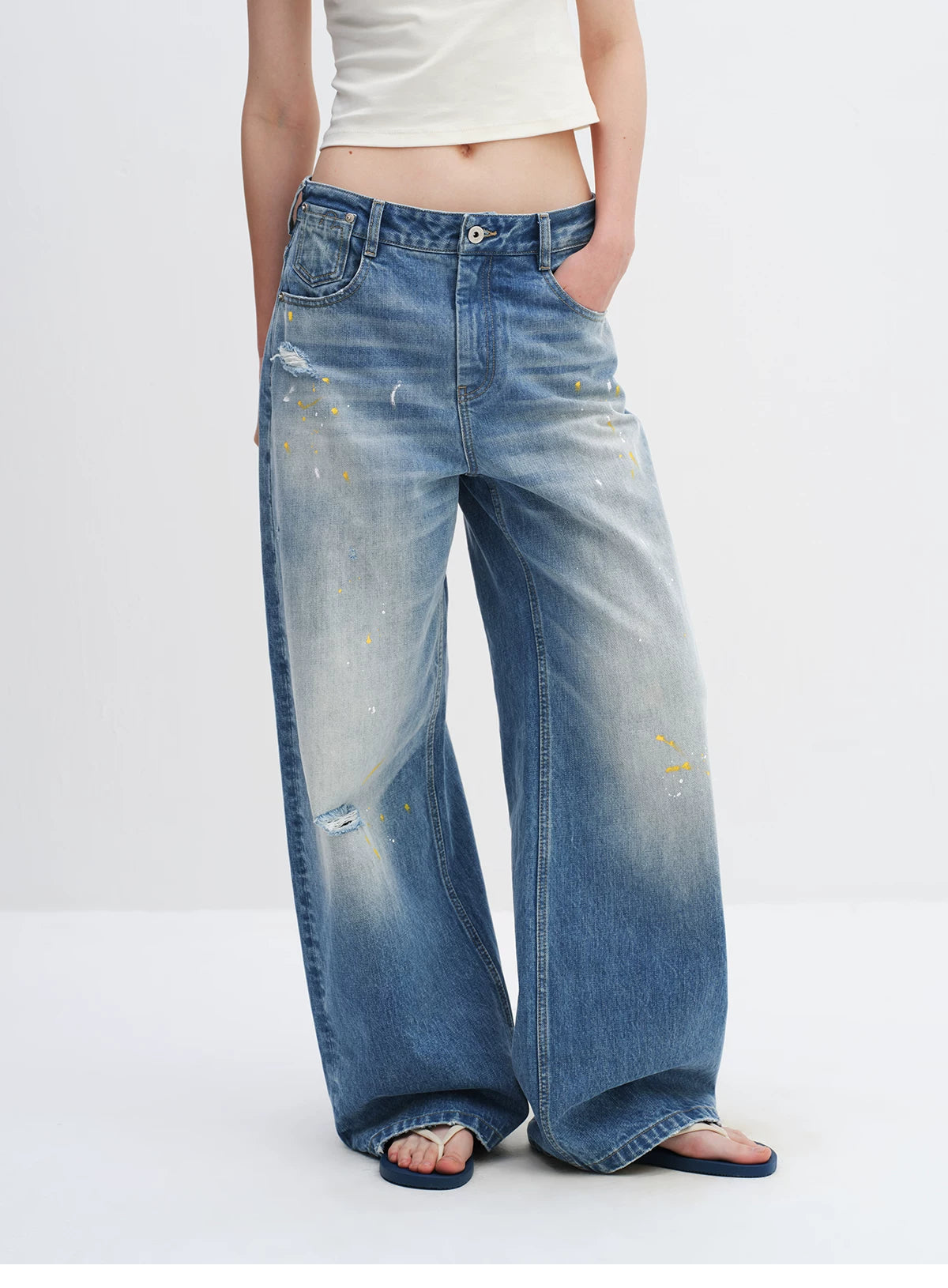 Washed Blue Curved-Leg Wide Denim Jeans
