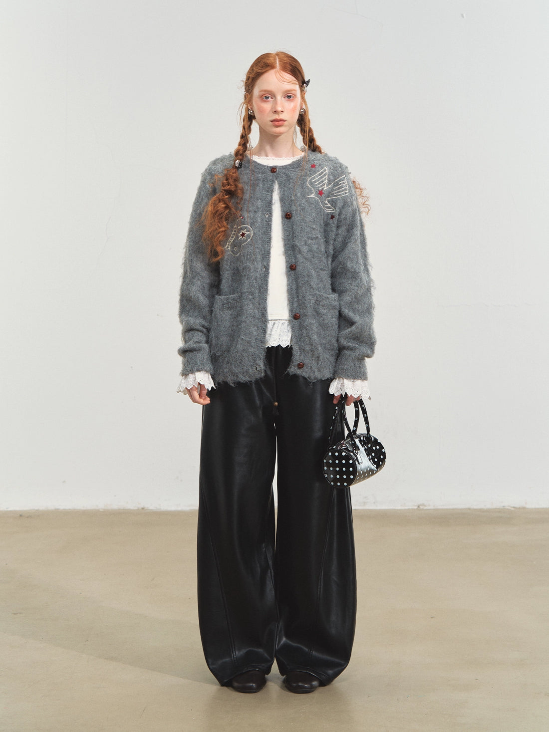 Relaxed Curve‑Hem PU Pants