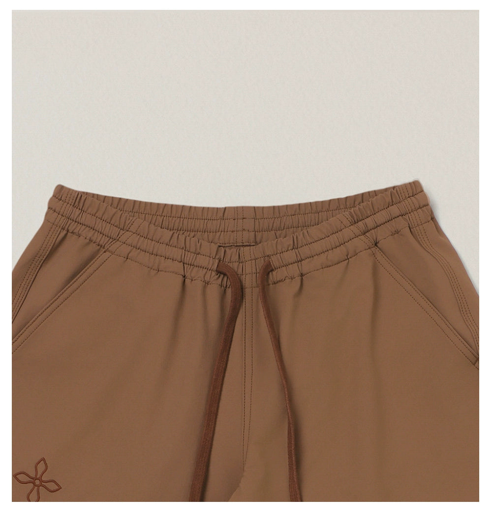 Cross Totem Outdoor Flare Pants