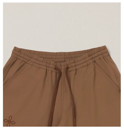 Cross Totem Outdoor Flare Pants