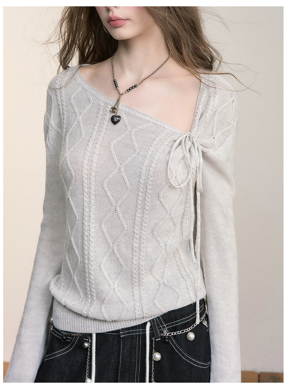 Asymmetrical Tie-Neck Cable Knit Sweater