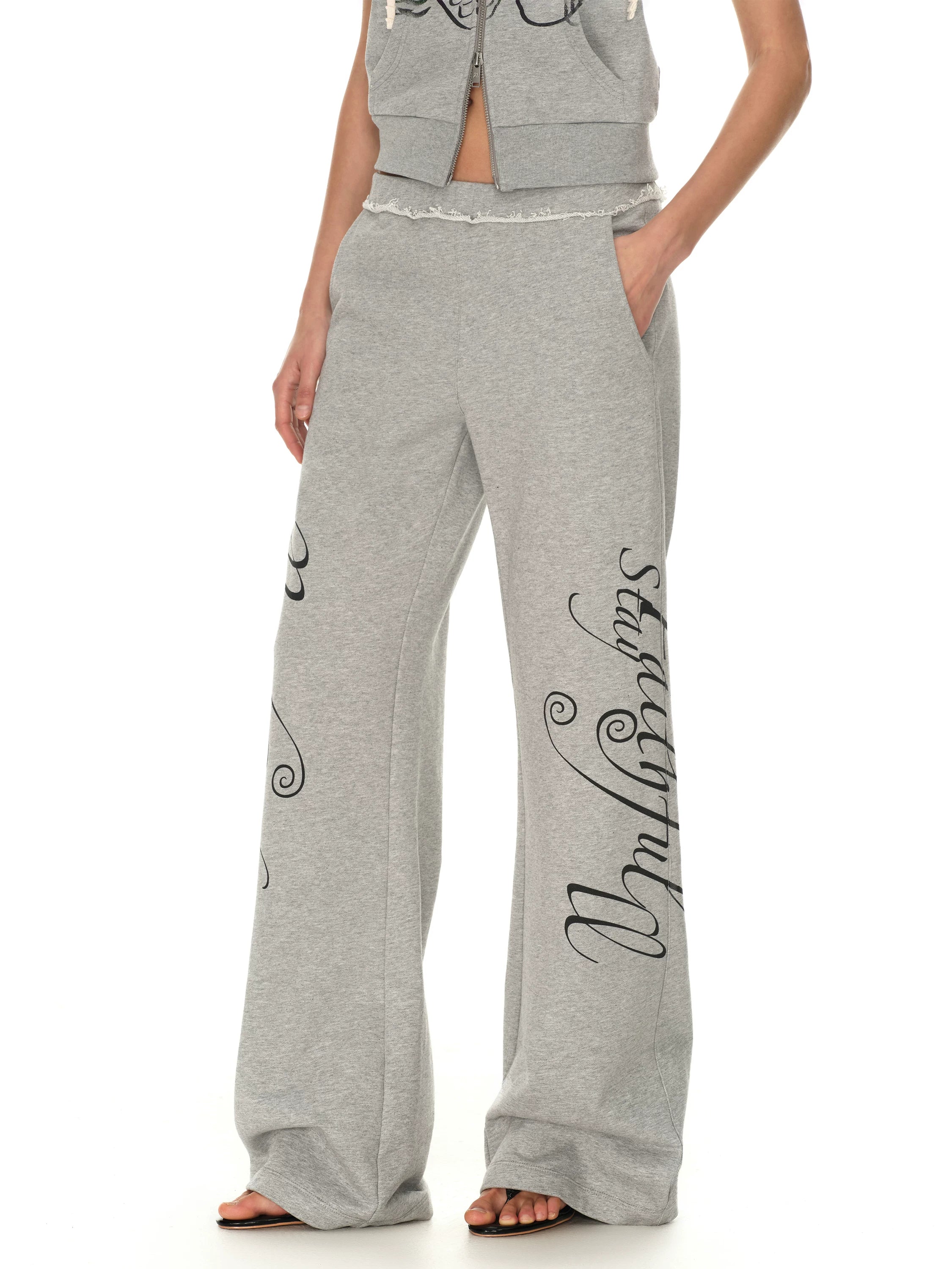 Rebel Script Print Relaxed Flared Sweatpants