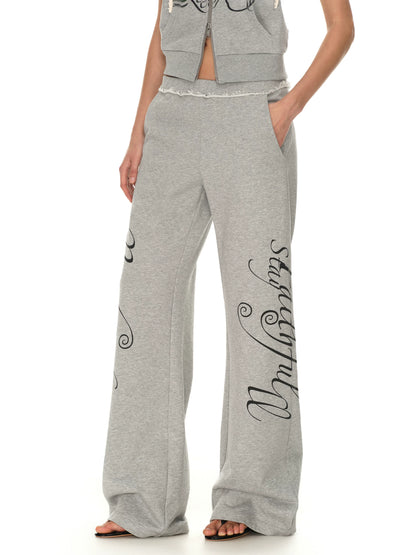 Rebel Script Print Relaxed Flared Sweatpants