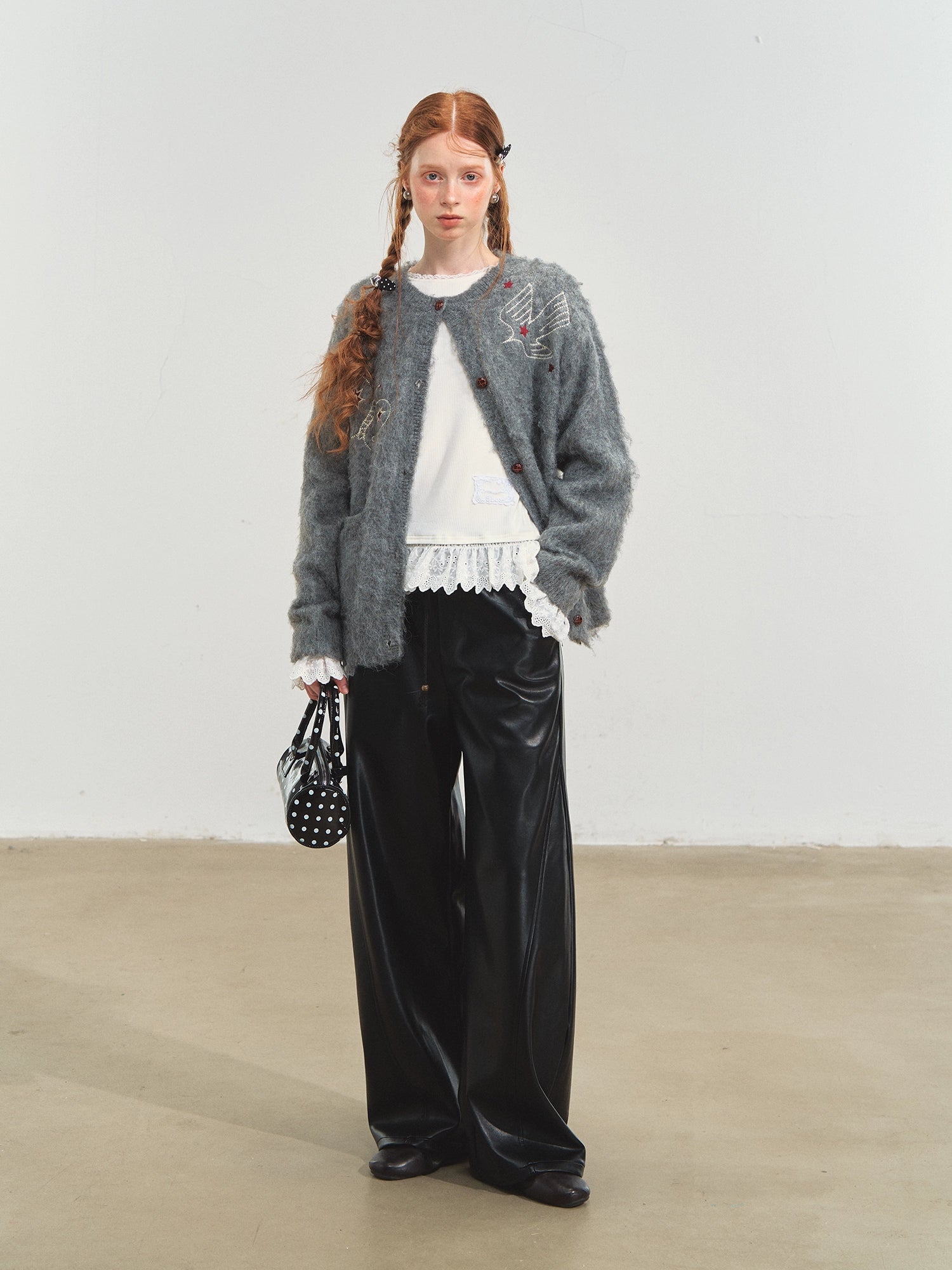 Relaxed Curve‑Hem PU Pants - CHINASQUAD