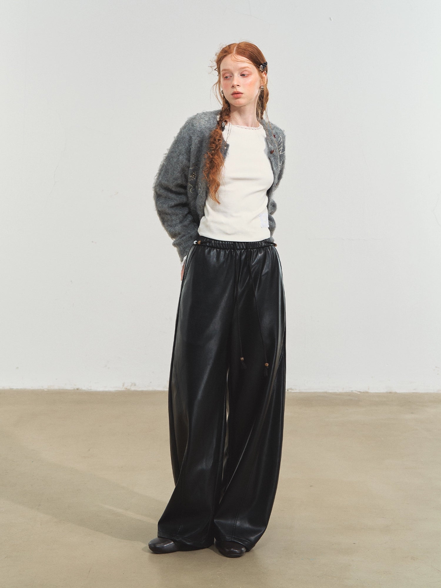 Relaxed Curve‑Hem PU Pants - CHINASQUAD