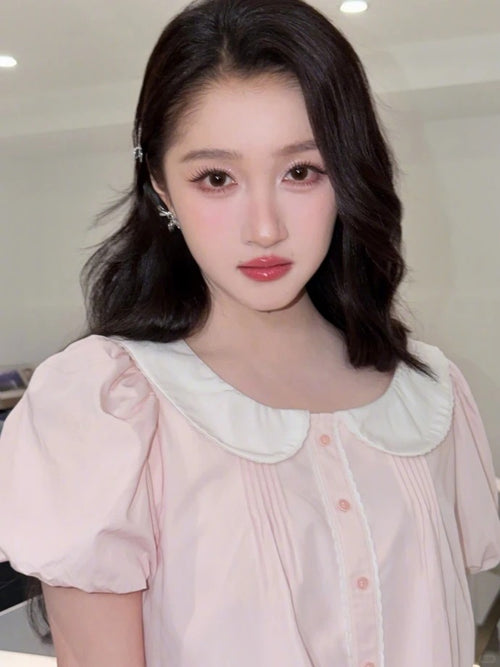 GUAN XIAOTONG