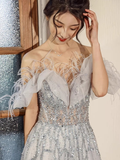 Feathered Scarlet Embellished Off-Shoulder Gown