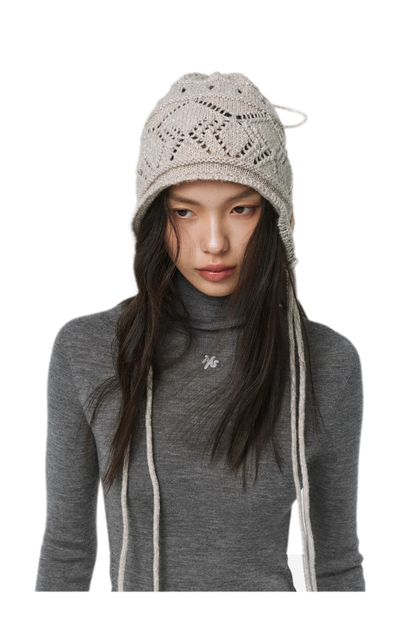 Gorro de punto grueso calado a rayas