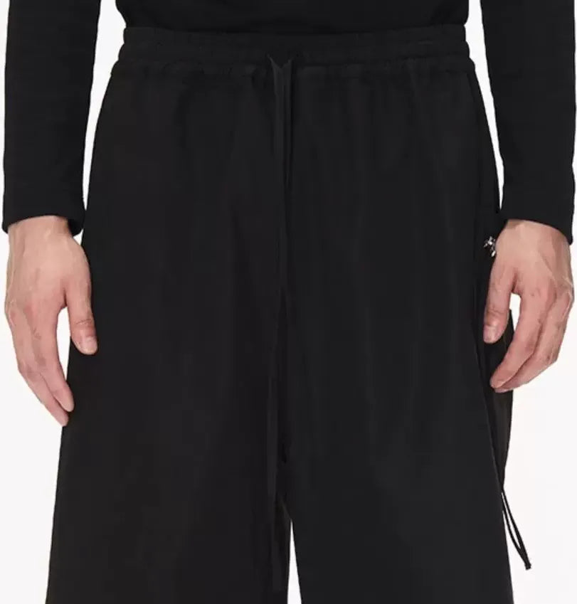 Sculptural Pleated Wide-Leg Trousers