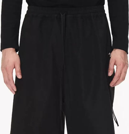 Sculptural Pleated Wide-Leg Trousers