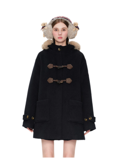 Manteau en laine texturée à boutons brandebourg