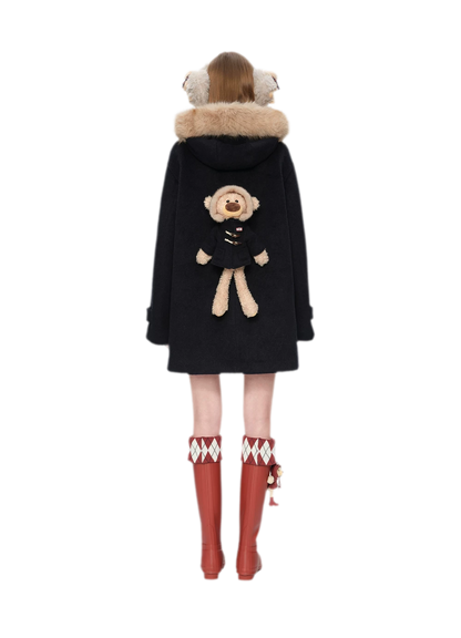 Manteau en laine texturée à boutons brandebourg
