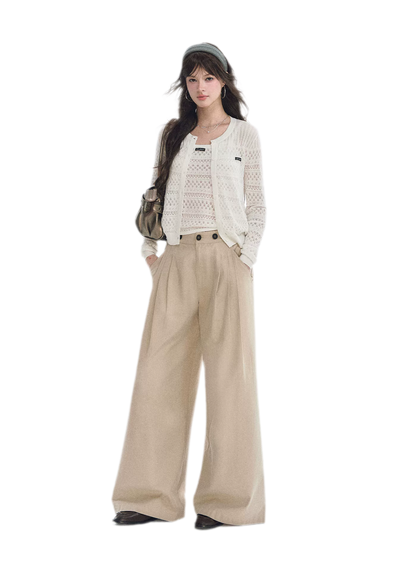 Pantaloni in cotone con pieghe e gamba ampia