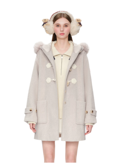 Manteau en laine texturée à boutons brandebourg