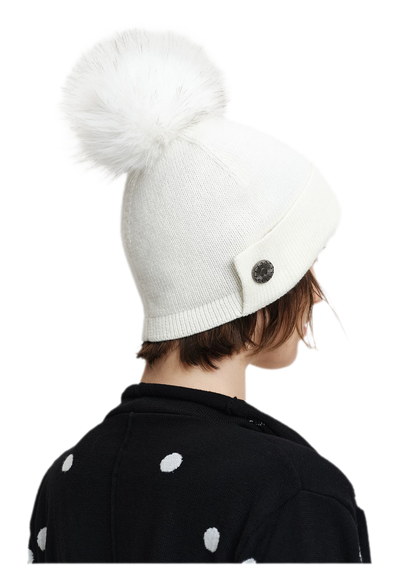 Cappello in lana con pompon e visiera