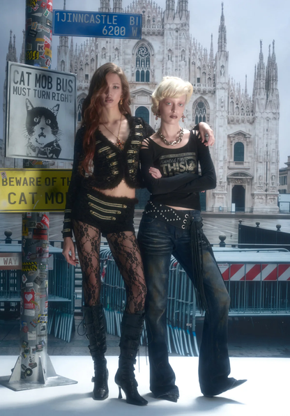 Set di cardigan e shorts con profili metallici