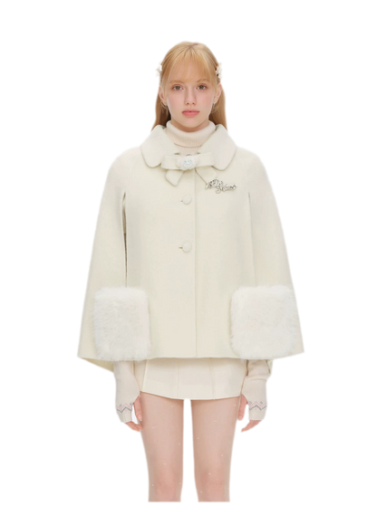 Cappotto mantella in peluche con fiocco