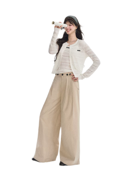 Pantaloni in cotone con pieghe e gamba ampia