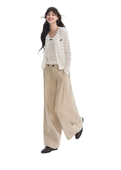 Pantaloni in cotone con pieghe e gamba ampia