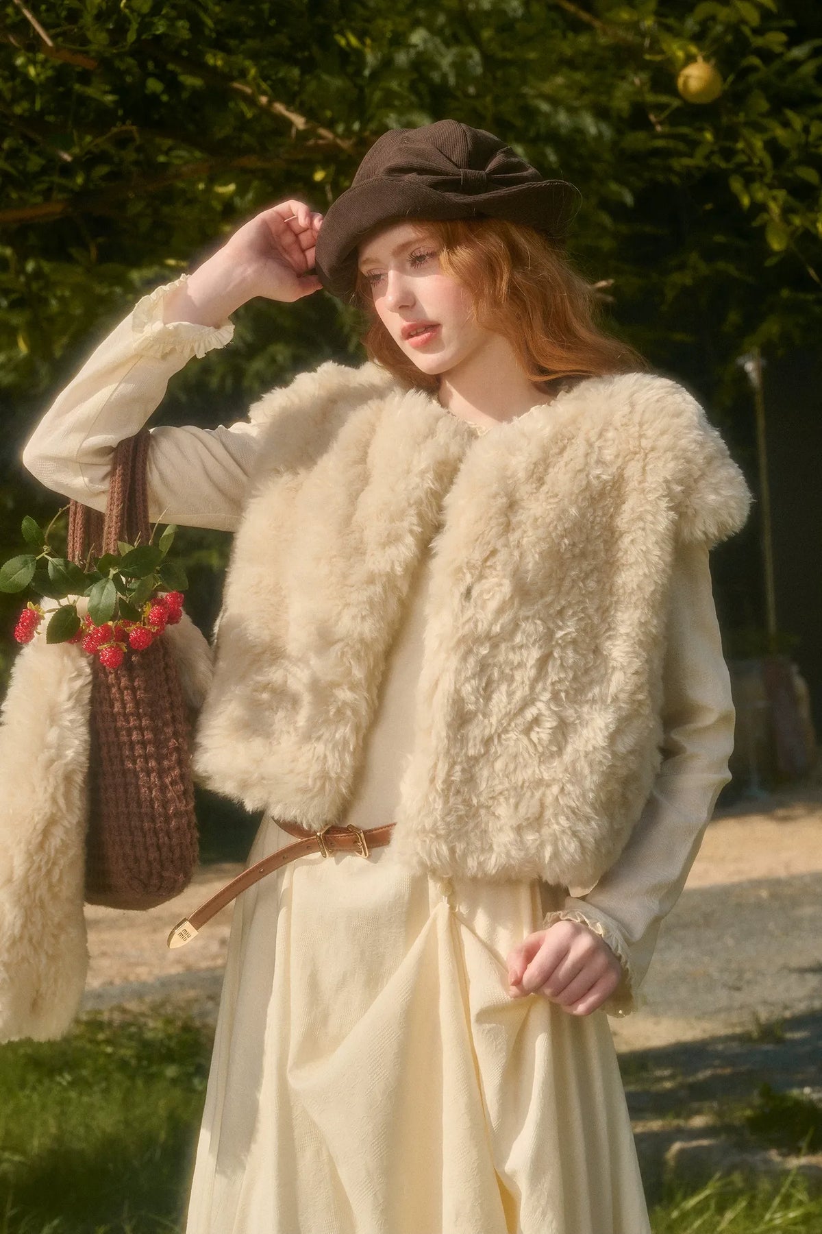 Gilet corto in ecopelliccia