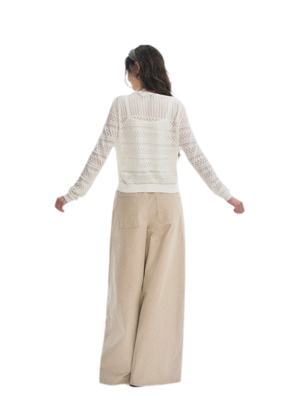 Pantaloni in cotone con pieghe e gamba ampia