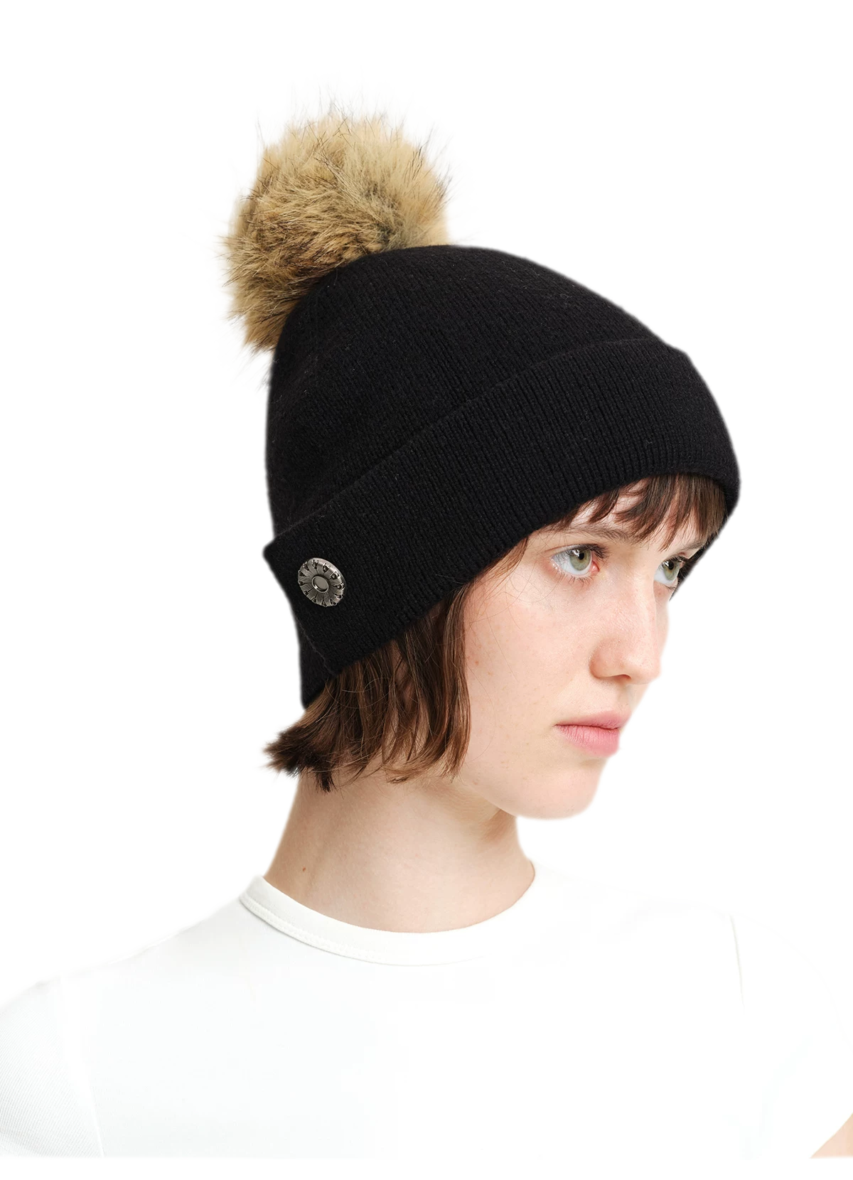 Cappello in lana con pompon e visiera